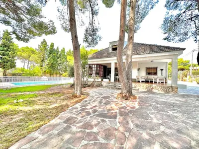 an image of a house with trees in the yard at Villa El Plantio in Pla del Pou