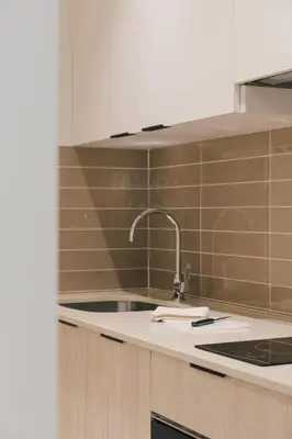 a kitchen with a sink and a faucet at GuestReady - Reental Apartments in Valencia