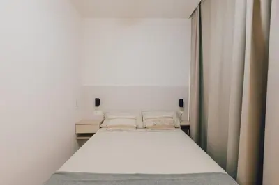 a bedroom with a white bed in a room at GuestReady - Reental Apartments in Valencia