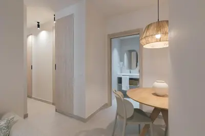 a kitchen and dining room with a table and chairs at GuestReady - Reental Apartments in Valencia