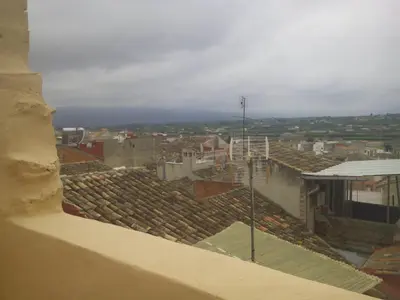 a view of roofs of buildings in a city at Ca'l Suecà in Chella