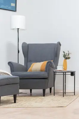 a blue couch in a living room with a table at Manya Valencia by Concept Flats in Valencia