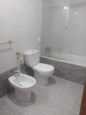 a bathroom with a toilet and a bidet at Apartamento Canet de Berenguer con terraza exterior a 100m de la playa in Canet de Berenguer