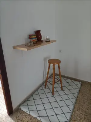 a stool sitting on a counter in a room at El Molino 2 Buñol Apartamento in Buñol