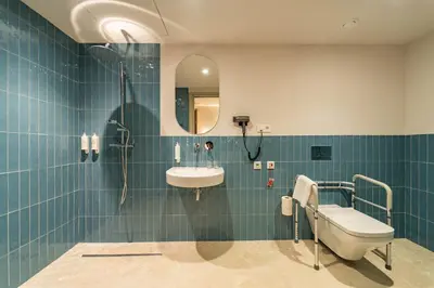 a hotel room with a bed and a couch at Hotel San Lorenzo Boutique Catedral in Valencia