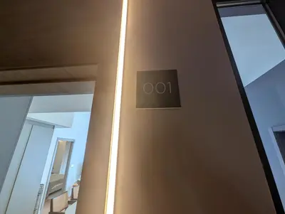 a door with a light on the side of it at Port Suites Corporate Living Apartments in Valencia