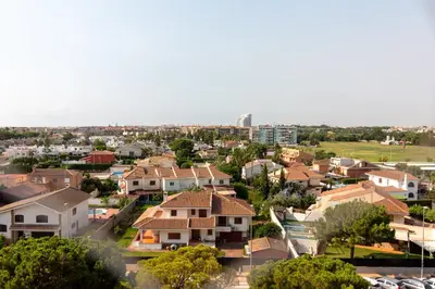 an aerial view of a residential suburb with houses at Global Vacacional, apartamento de una habitación en urbanización con piscina in Canet de Berenguer