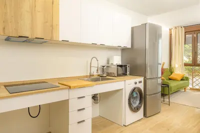 a kitchen with a sink and a washing machine at VL - Carrer de Berni i Catala in Valencia