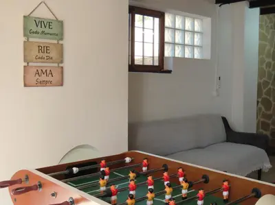 a living room with a pool table and a couch at Casa Playamonte in Navarrés