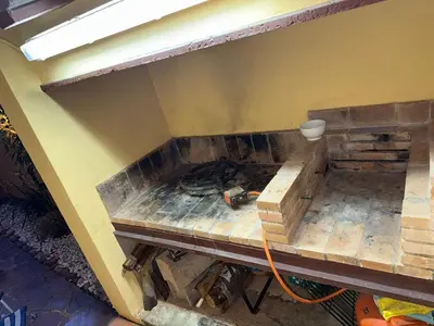 a brick oven being built in a room at Oceanfront Ideal for couples and teleworking in Moncófar
