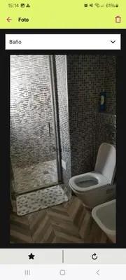 a bathroom with a shower with a toilet and a sink at FC house in Valencia
