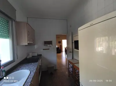 a kitchen with a sink and a counter top at Chalet en el parque natural de la Calderona in Náquera