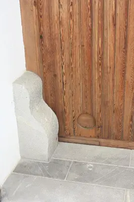 a wooden door with a stone stair case in a room at Casa Rural 