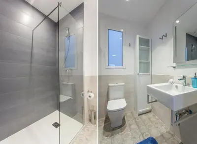a bathroom with a shower and a toilet and a sink at Apartment with terrace in Extramurs in Valencia