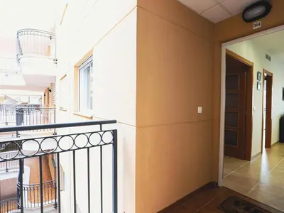 a hallway of a building with a balcony at Spectacular views of the sea and the lighthouse in Canet de Berenguer