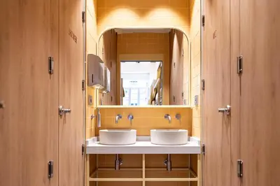 a room with two bunk beds with a door open at Camila Hostel Valencia in Valencia