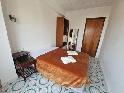 a bedroom with a bed with two towels on it at 3 Bedroom Apartment with Balcony, Lift and AC in Every Room, 114 m2 in Nules