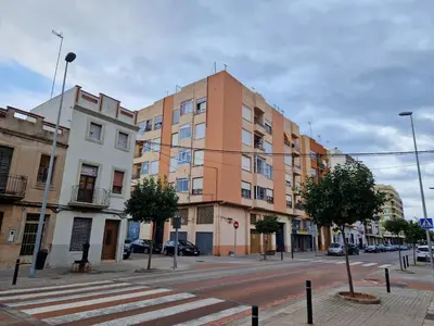 a large building on a street in a city at 3 Bedroom Apartment with Balcony, Lift and AC in Every Room, 114 m2 in Nules