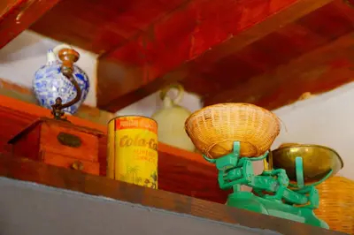 a light on a shelf with other items on it at Casa Rural La Rocha in Chulilla
