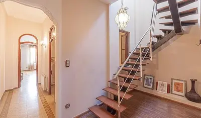 a hallway with a staircase in a home at Beautiful House with terrace in Valencia