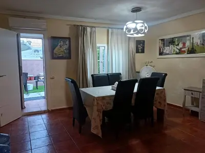 a dining room with a table and chairs at Beautiful bedroom Country Villa with swimming pool in Lliria