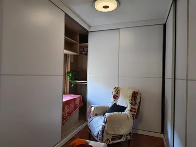 a person sitting in a chair in a room at Beautiful bedroom Country Villa with swimming pool in Lliria