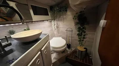 a bathroom with a sink and a toilet in it at Unique Experience in Sailboat! In The 4 Seasons!! B shi in Valencia