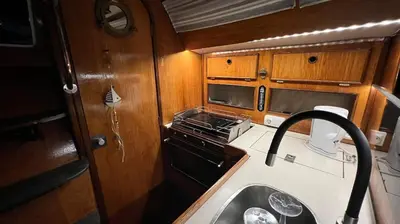 a small kitchen with a stove and a sink at Unique Experience in Sailboat! In The 4 Seasons!! B shi in Valencia