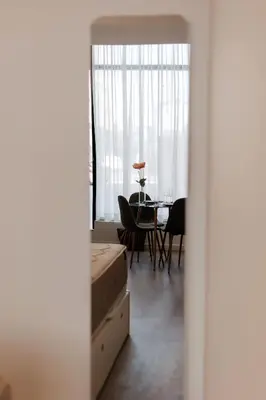 a room with a table and a dining room at Luxury apartment in Valencia in Valencia