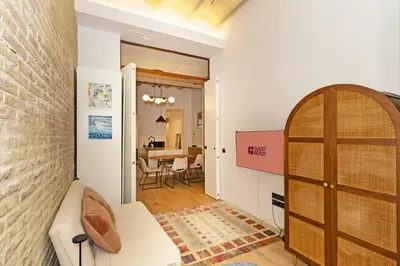a living room with a couch and a table at Guestready - Bright stay at Cabanyal in Valencia