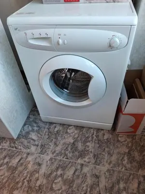 a washing machine with its door open in a bathroom at Sea and Sun con vistas a la playa San Antoni in Cullera
