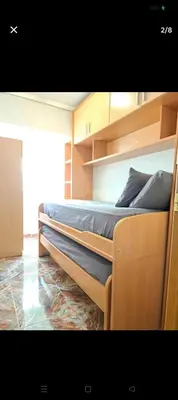 a bedroom with two bunk beds in a room at Habitación con dos camas para dos personas in Valencia