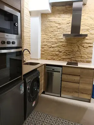 a kitchen with a microwave oven and a dishwasher at Apartamentos Valencia Centro 1 in Valencia