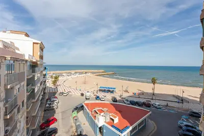 a view of the beach from a building at Seaview Apartment N12 in El Perelló