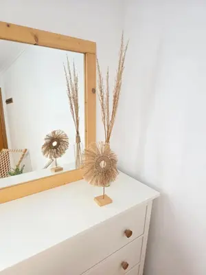 a white dresser with a mirror on top of it at Villa Entre-Azahar, Tu refugio de tranquilidad in Lliria