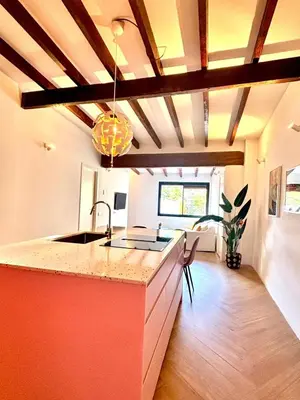a kitchen with a sink and a counter top at Casa Tossal in Valencia