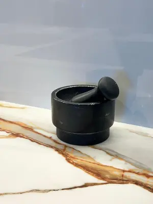 a black bracelet sitting on top of a table at Alameda Stay - Apartamento lujoso Ciudad de las Artes y las Ciencias in Valencia