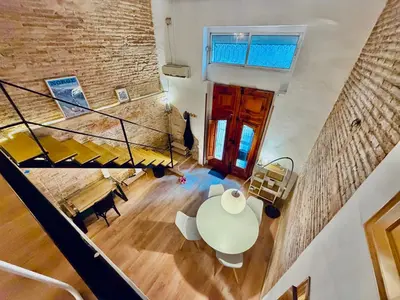an overhead view of a living room with a table at Duplex en el Carmen in Valencia