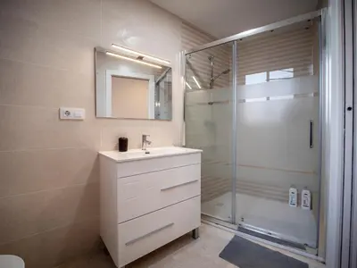 a bathroom with a sink and a shower at Apartment Ruzafa Market 6B in Valencia