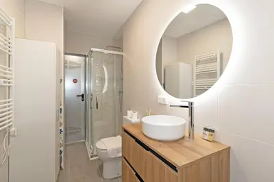 a bathroom with a sink and a mirror at GuestReady - Fontilles apartments in Valencia