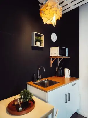 a kitchen with a sink and a counter top at Cozy Room G20 in Valencia
