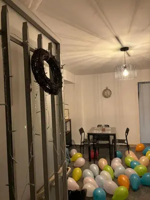 a room filled with lots of balloons and a table at Villa punta RJ in Pavías