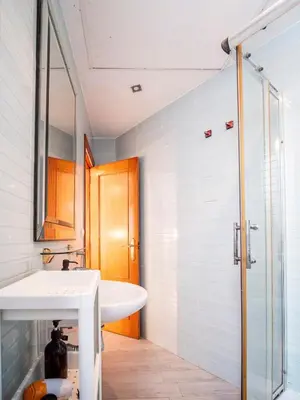 a bathroom with a sink and a shower at Apartment Ruzafa Market 8A in Valencia