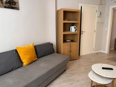 a living room with a couch and a table at Apartment Ruzafa Market 8B in Valencia