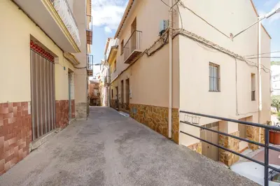 an empty alleyway between two buildings at Gatova Sunset Retreat in Gátova