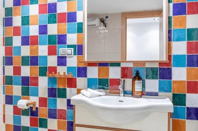 a bathroom with a sink and a mirror at Gatova Sunset Retreat in Gátova
