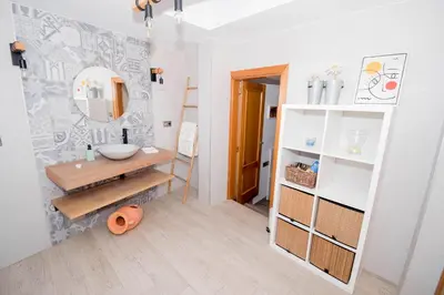 a bathroom with a sink and a mirror at En el corazón de Sagunto in Sagunto