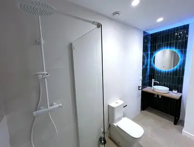 a bathroom with a shower and a toilet and a sink at PN4- Loft Valencia N4 Urban Ayora in Valencia