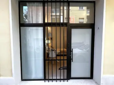 a glass door with a toilet in a room at PN4- Loft Valencia N4 Urban Ayora in Valencia
