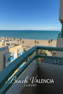 a view of the beach from the balcony of a beach villa at BEACH VALENCIA LUXURY D7-21 Apartment with terrace and sea views with two rooms in Valencia